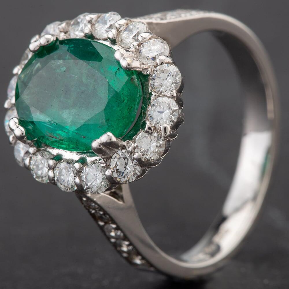 Pre-Owned 14ct White Gold Oval Emerald and Diamond Cluster Ring 4312333